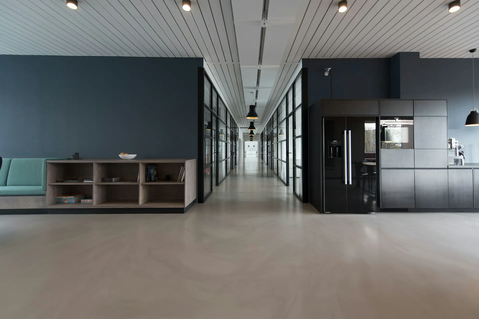 Bright modern workspace with long desks and large windows